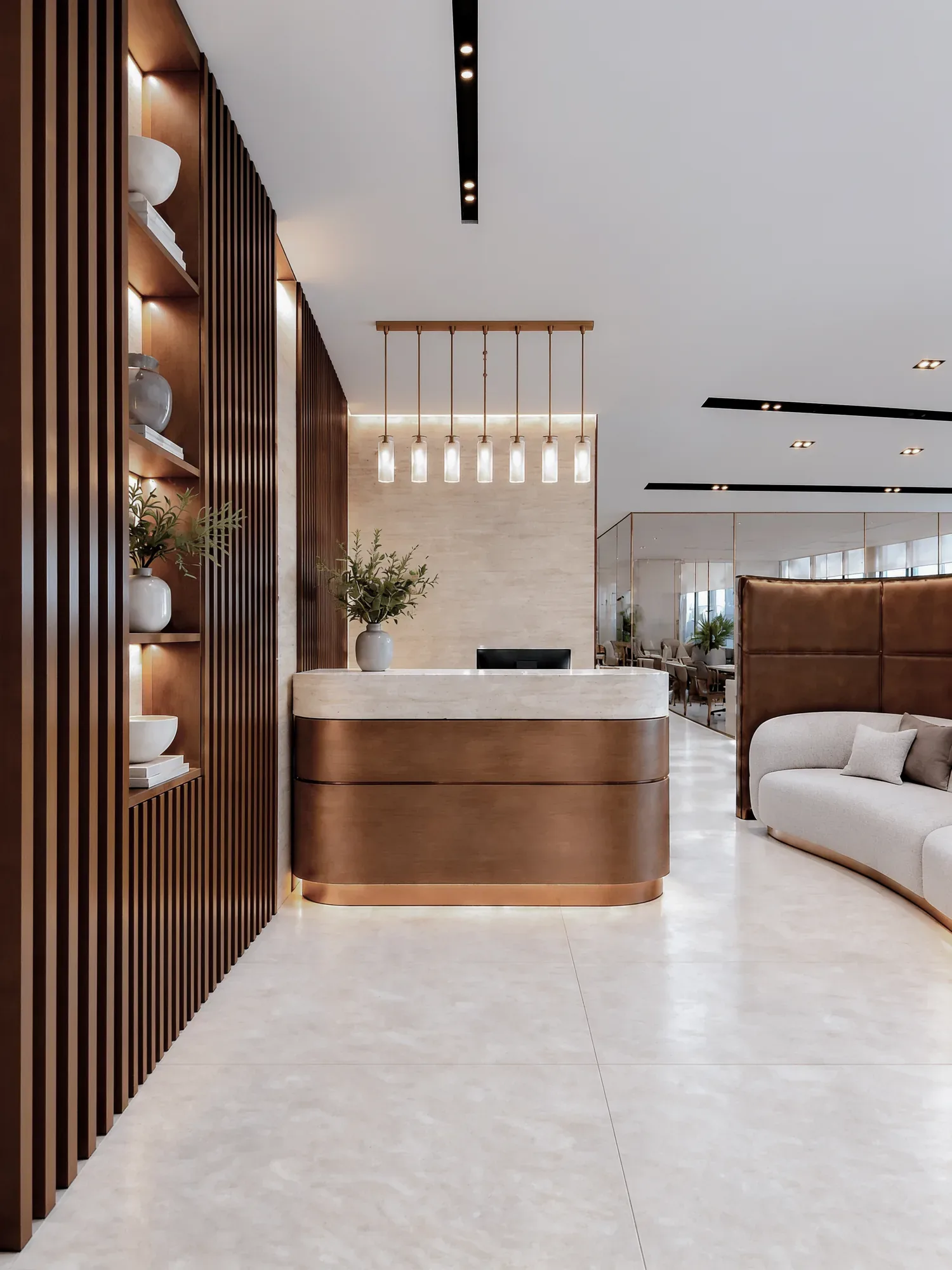 Office reception in walnut and cream stone, JLT Dubai
