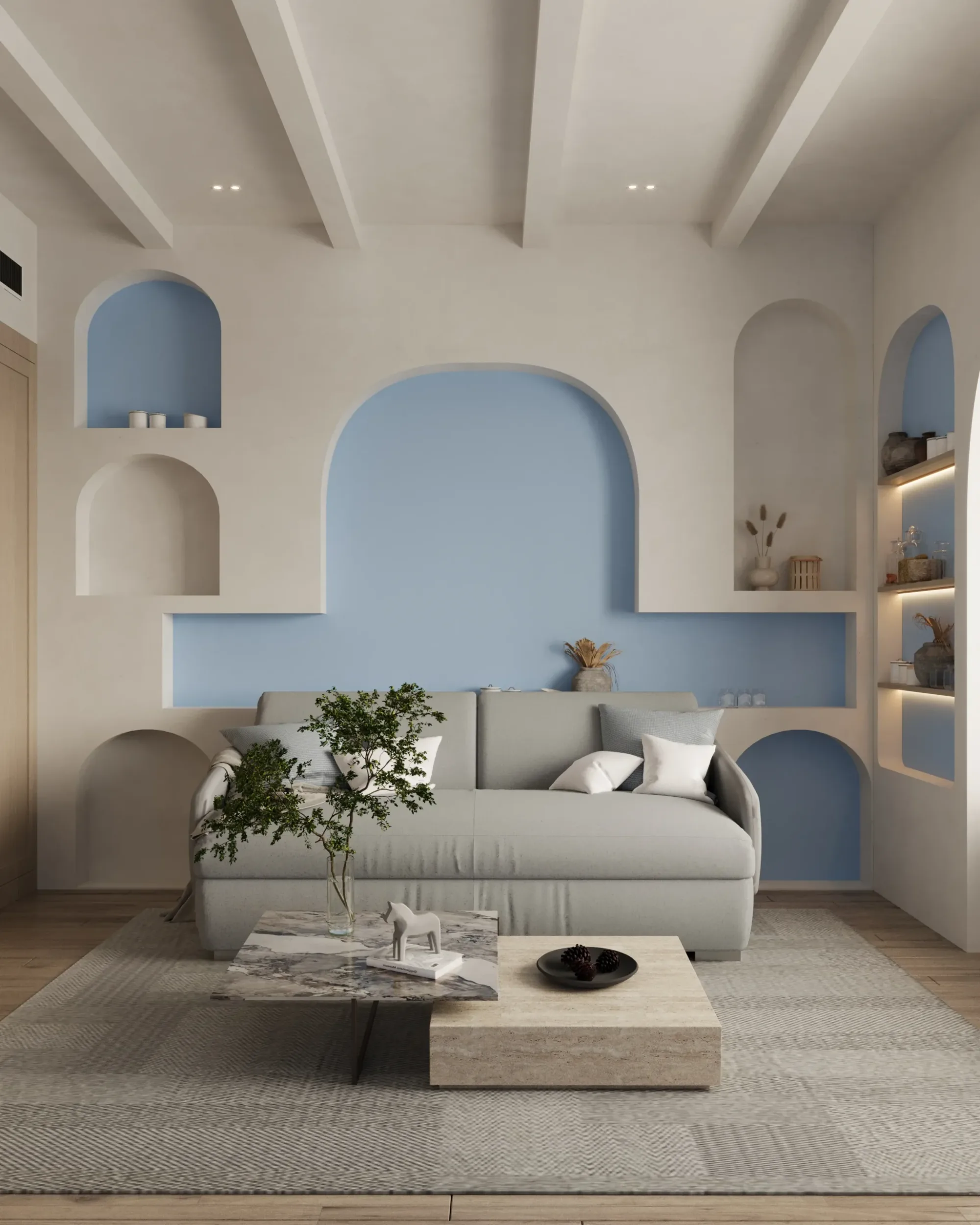 Living room with plaster arches and blue niches, private residence in Dubai